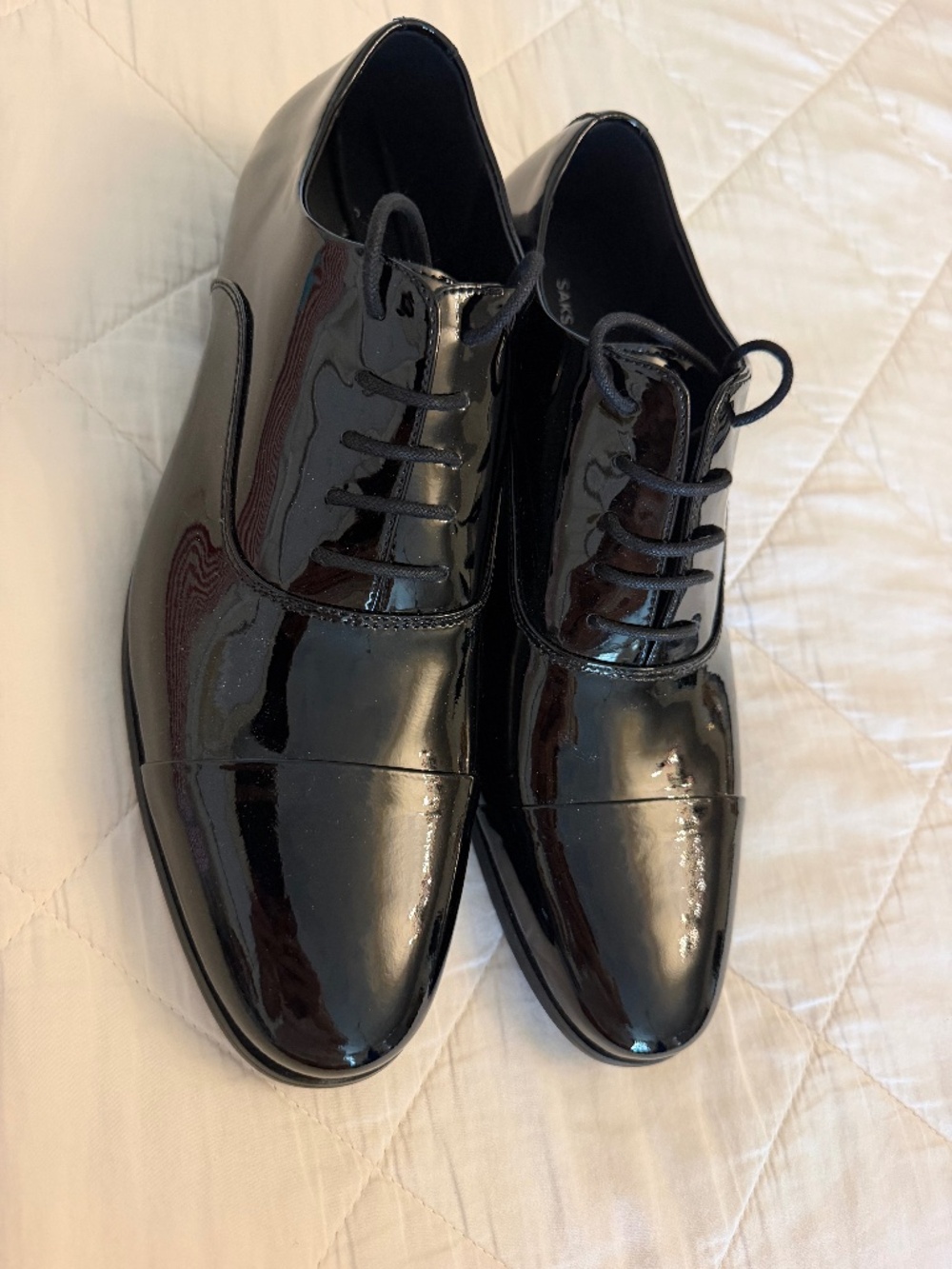Men’s black patent leather dress shoes